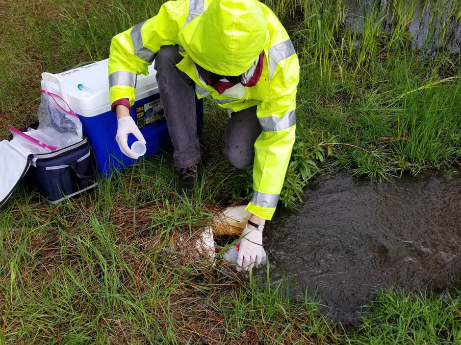 Wildscape engineer sampling stormwater runoff